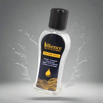 Bilkence Hair Style Serum bottle with water splash effect on a gray background